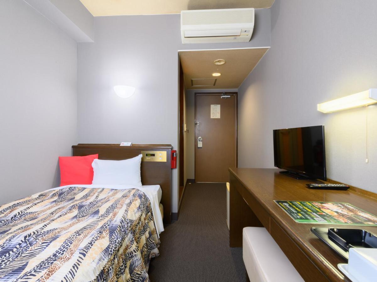 Tabist IWATA Station Hotel Exterior foto