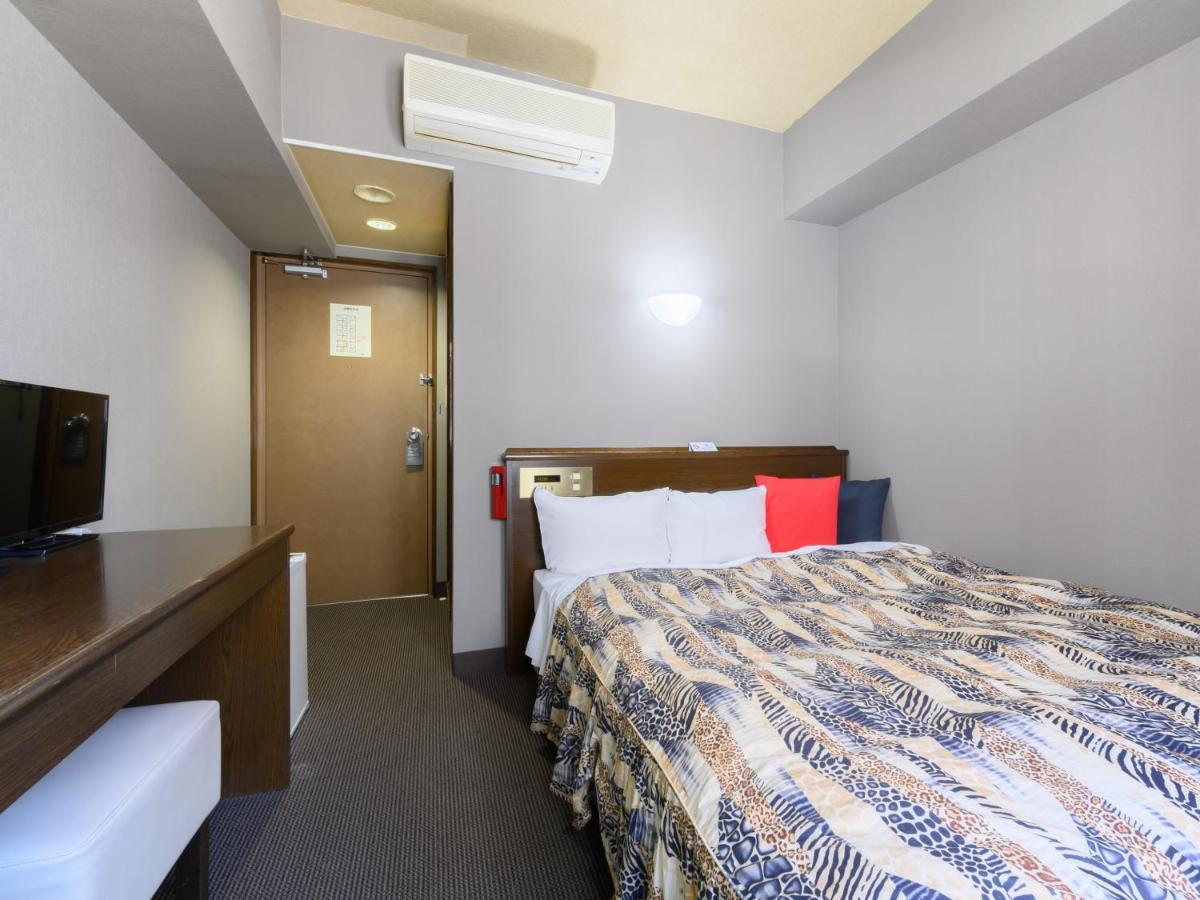 Tabist IWATA Station Hotel Exterior foto