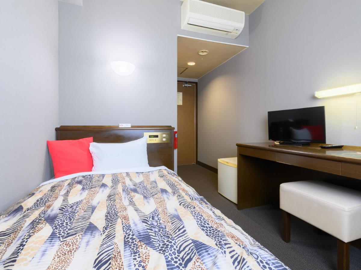 Tabist IWATA Station Hotel Exterior foto
